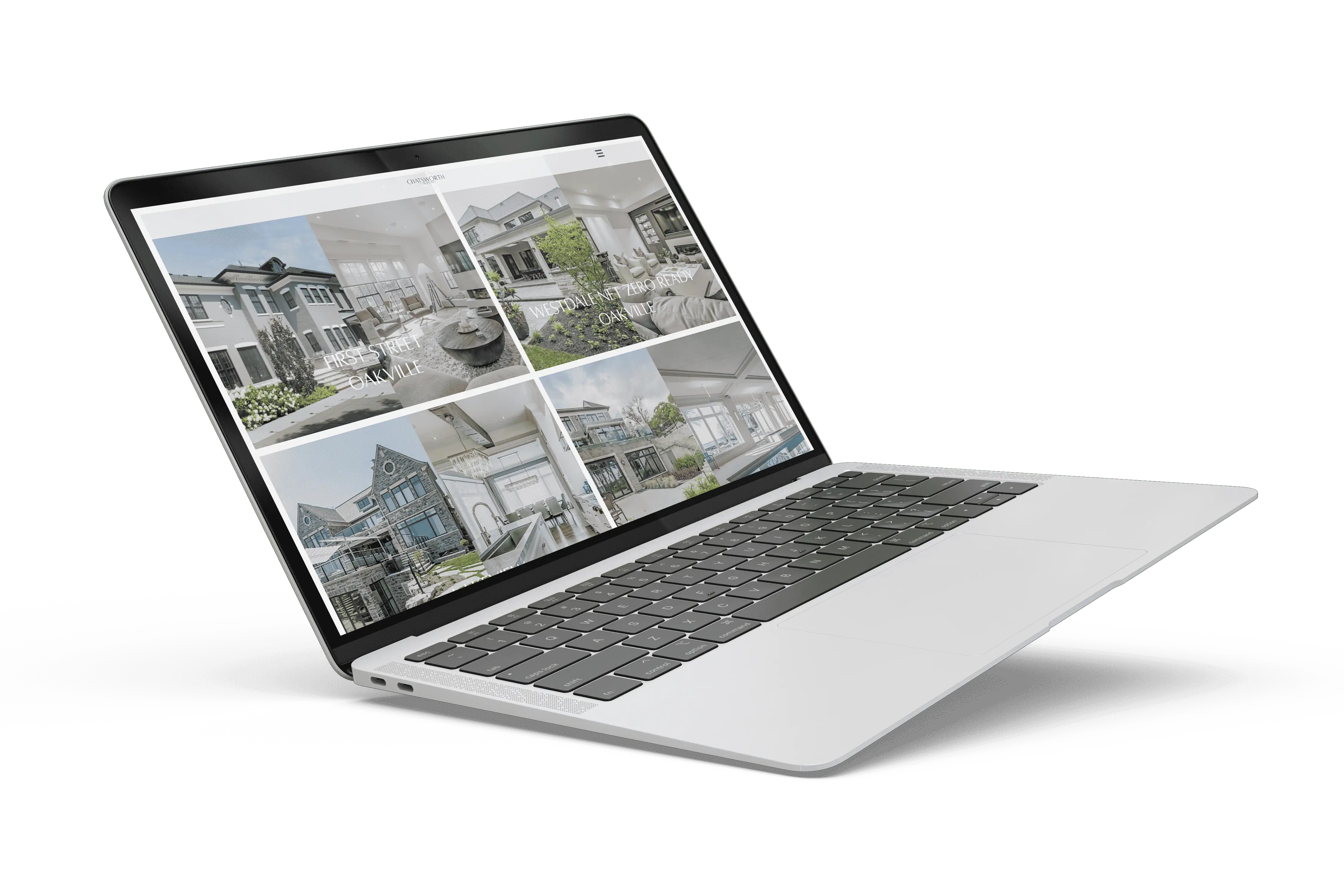 A laptop with pictures of houses on it.