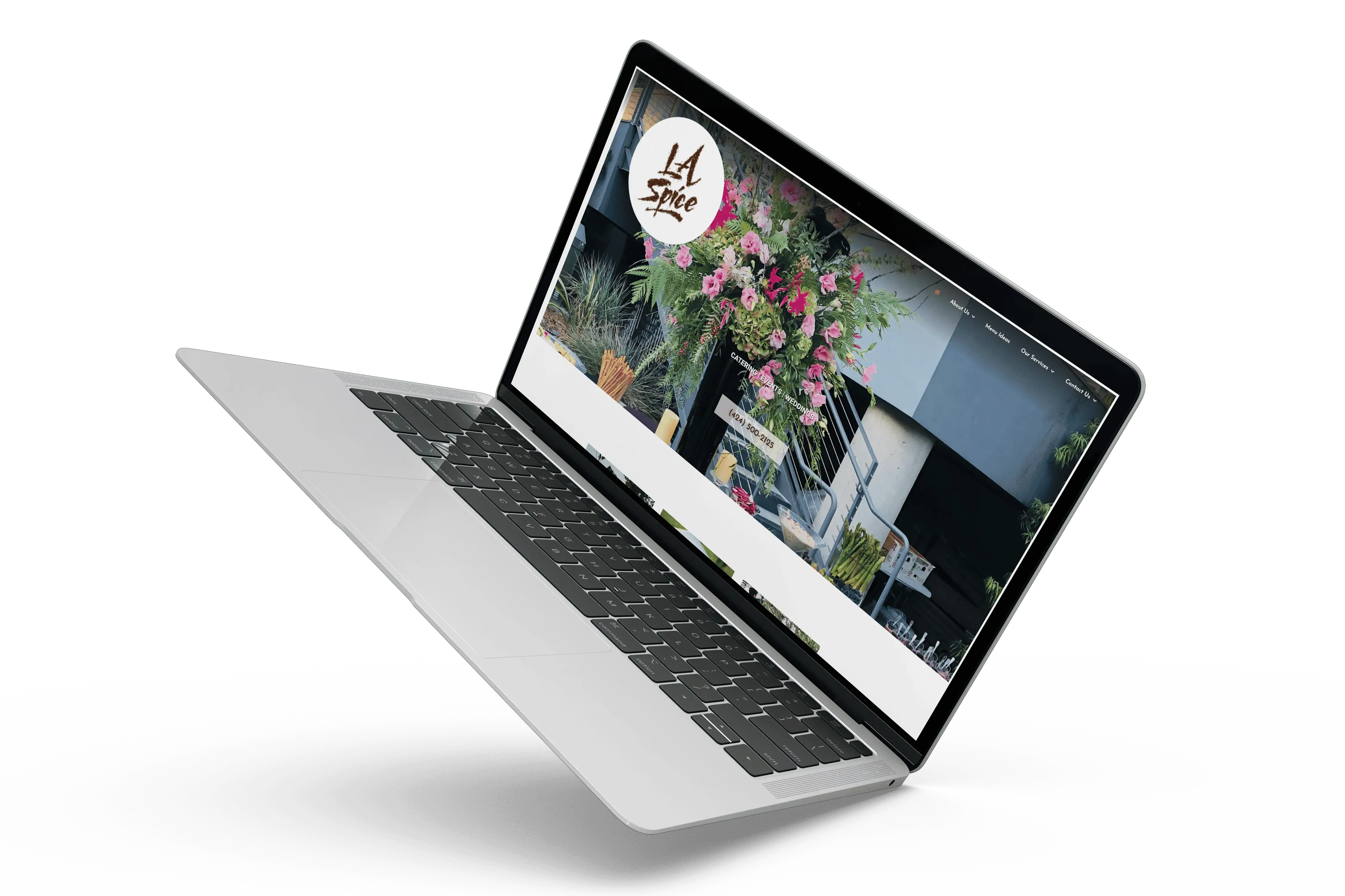 An image of a laptop with flowers on it.