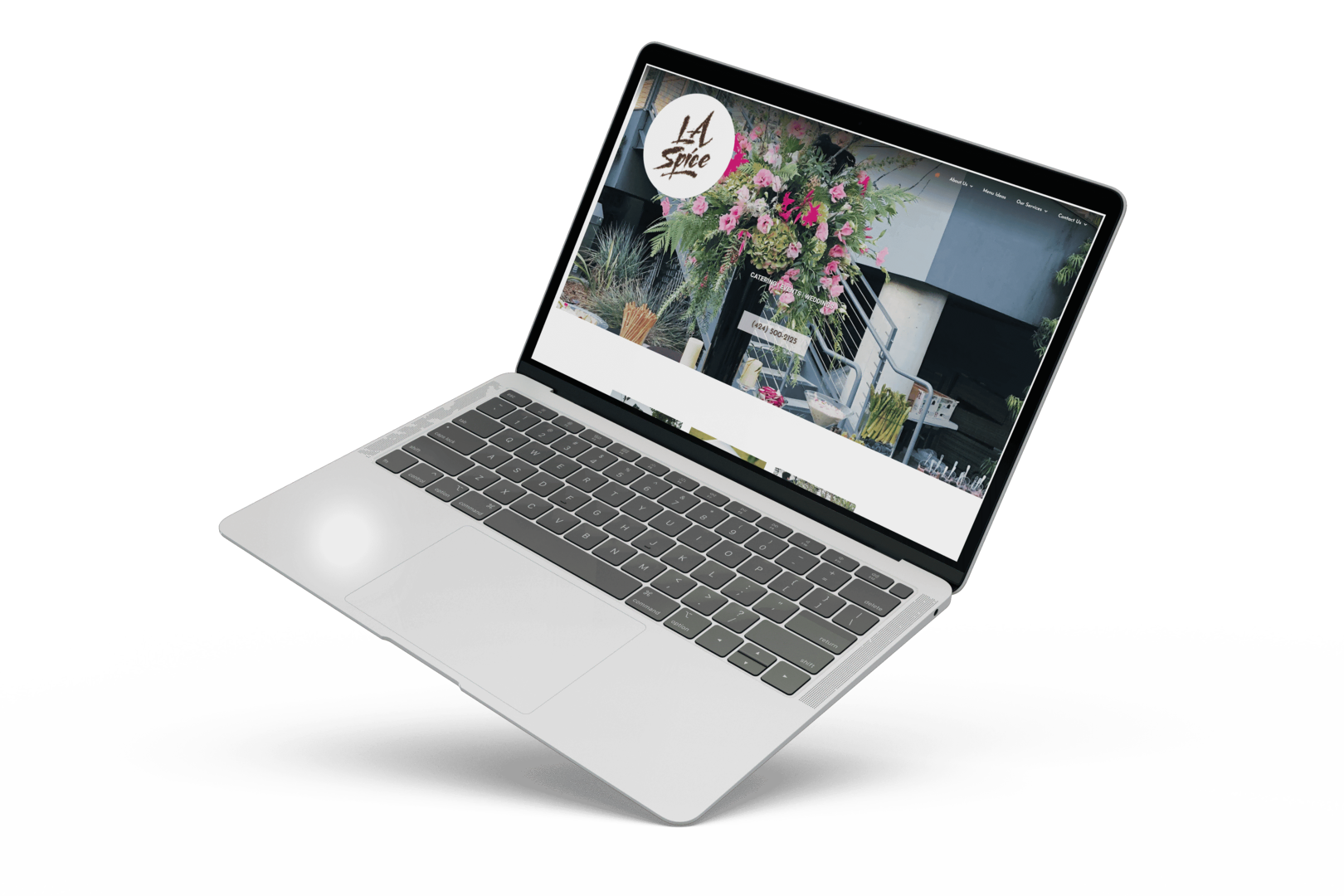 An image of a laptop showcasing LA Spice Catering's portfolio.