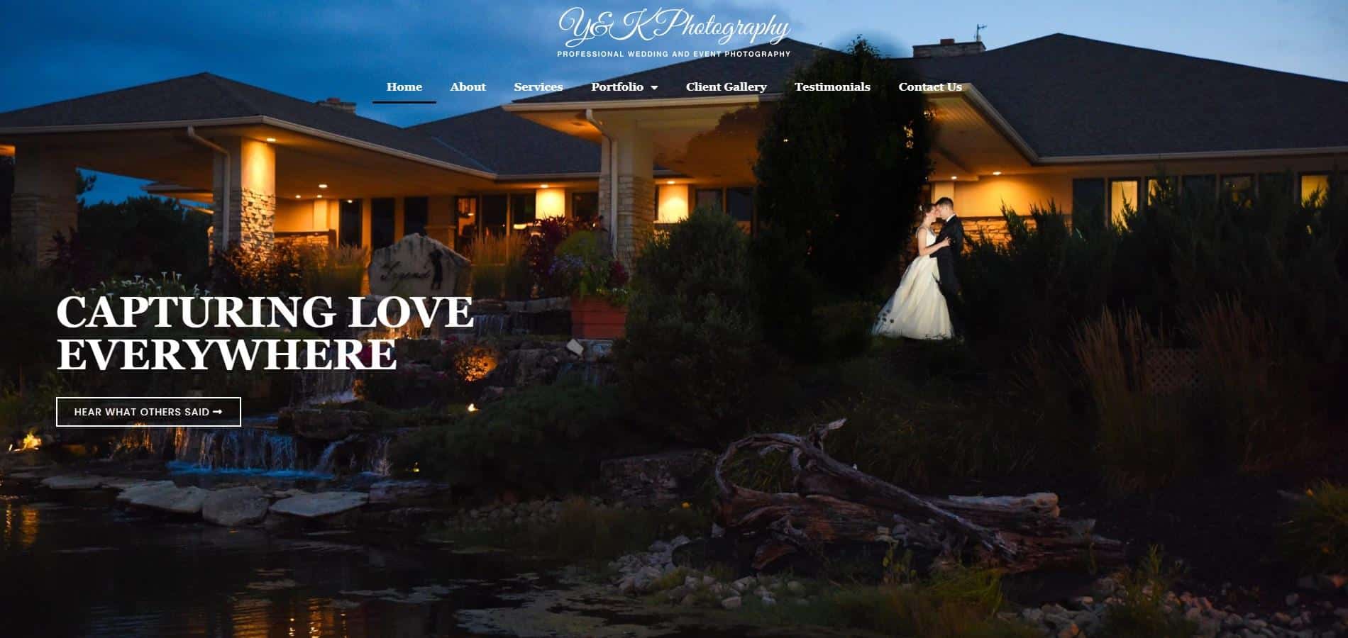 Portfolio | YK Photography A wedding website with a bride and groom in front of a lake.