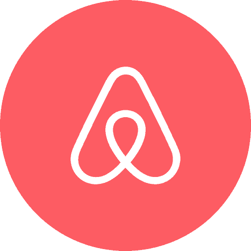 The airbnb logo on a pink background.