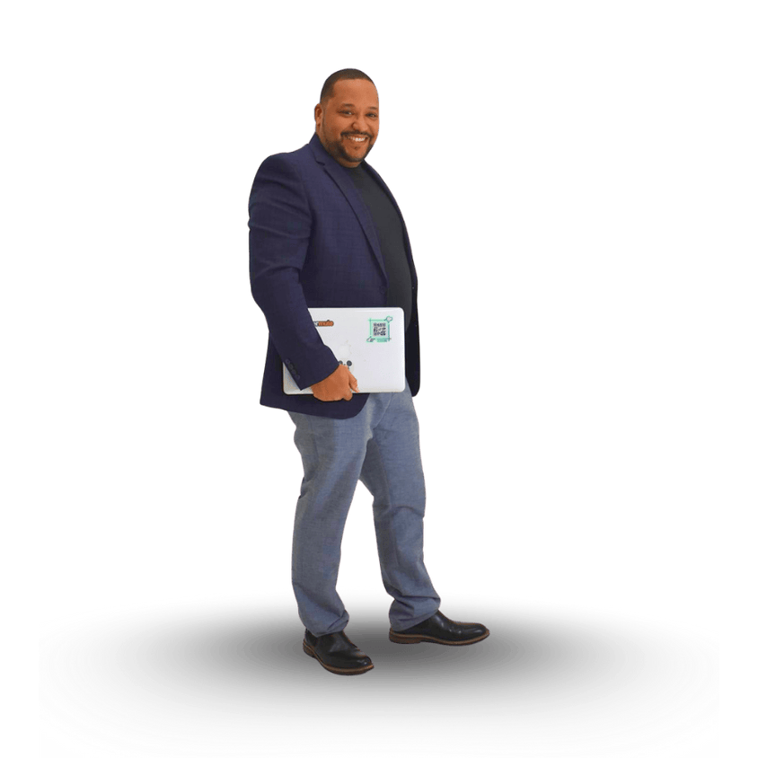 preston standing with laptop