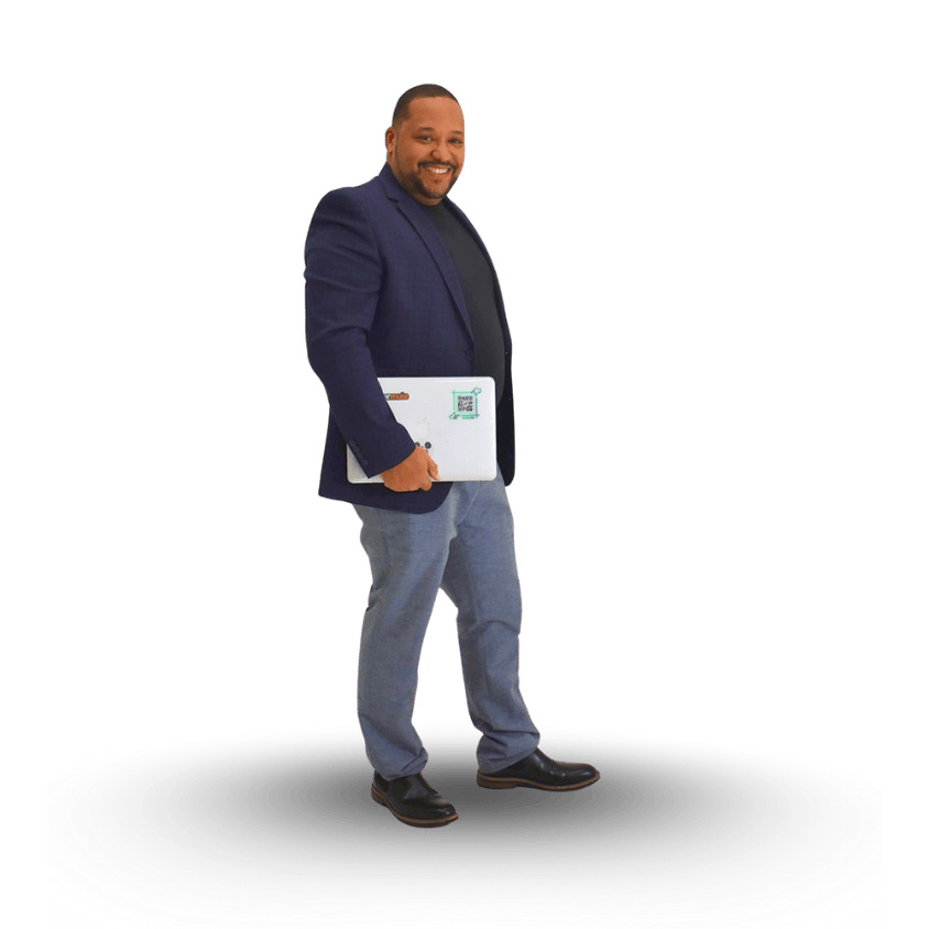 preston standing with laptop