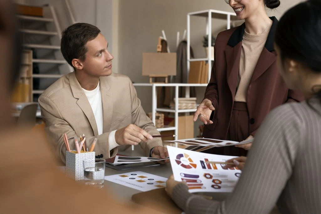 Reputation Management Reddit: How to Use Reddit to Shape Your Brand Image side view colleagues working as team