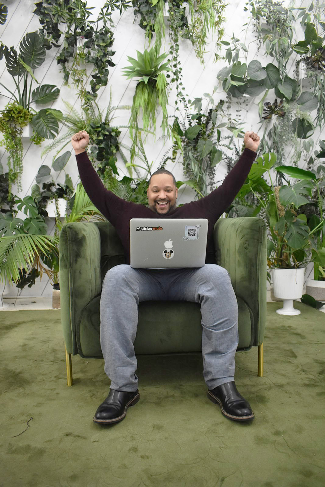 Preston happy looking on laptop